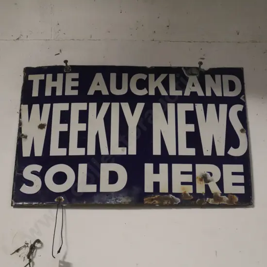 The Auckland Weekly News Enamel Sign