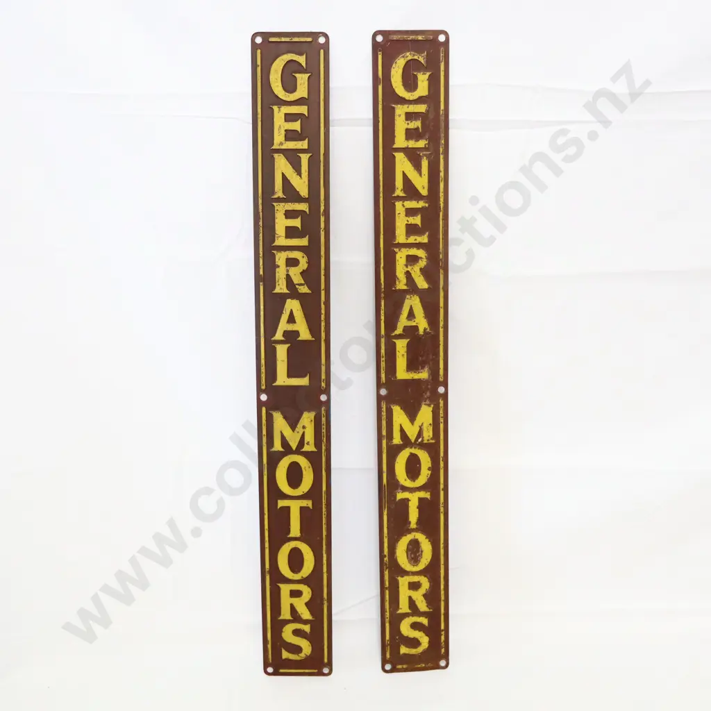 Pair General Motors Embosed Signs Image 1++
