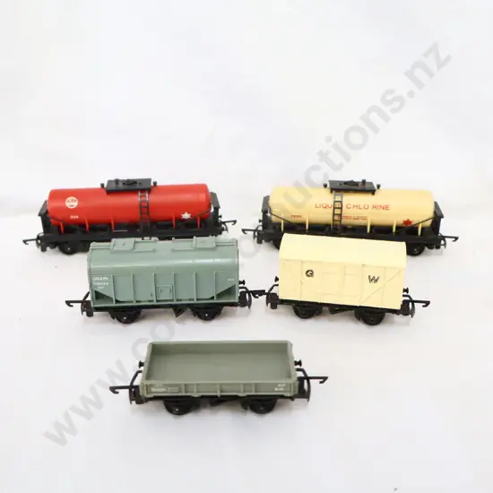 5 x  Assorted   2 x Tanks  1 x low sided wagon 1 x Grain wagon  1 x covered   Not Boxed 