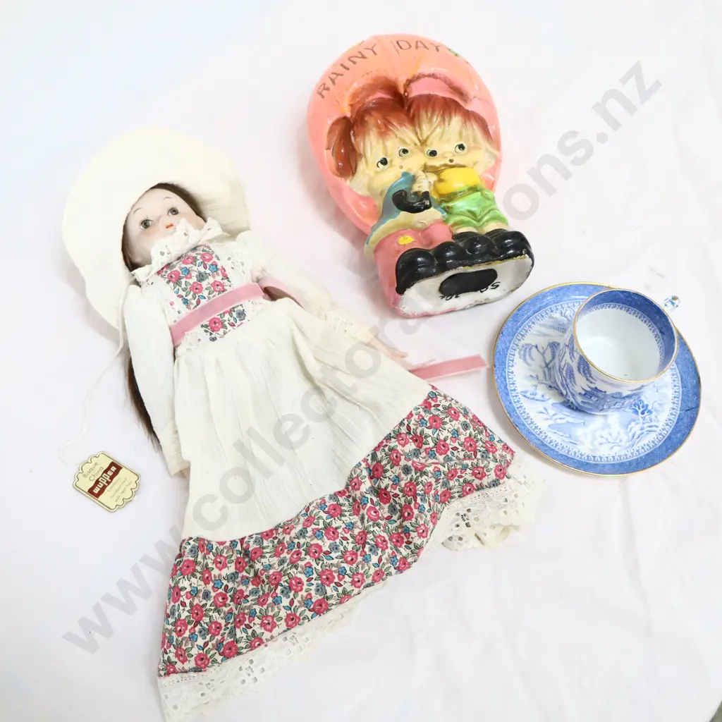 Assorted toys   Doll, money box, cup and saucers Image 1++