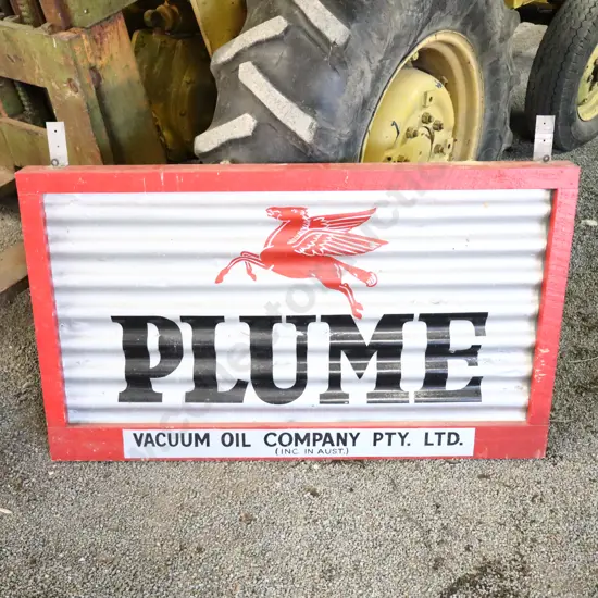 Modern Plume Sign On Corrogated Iron