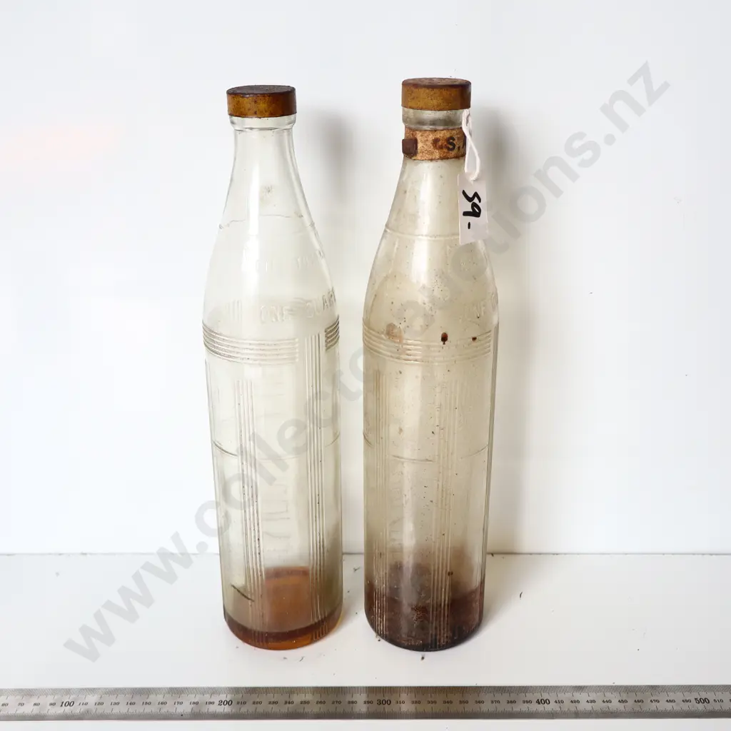 Pair of Europa-Lube Bottles Image 1++