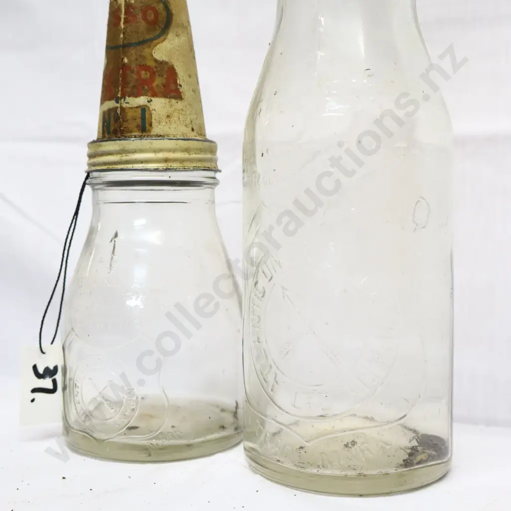 Pair of Antantic Oil Embossed Oil Bottles And Tin Tops Image 1++