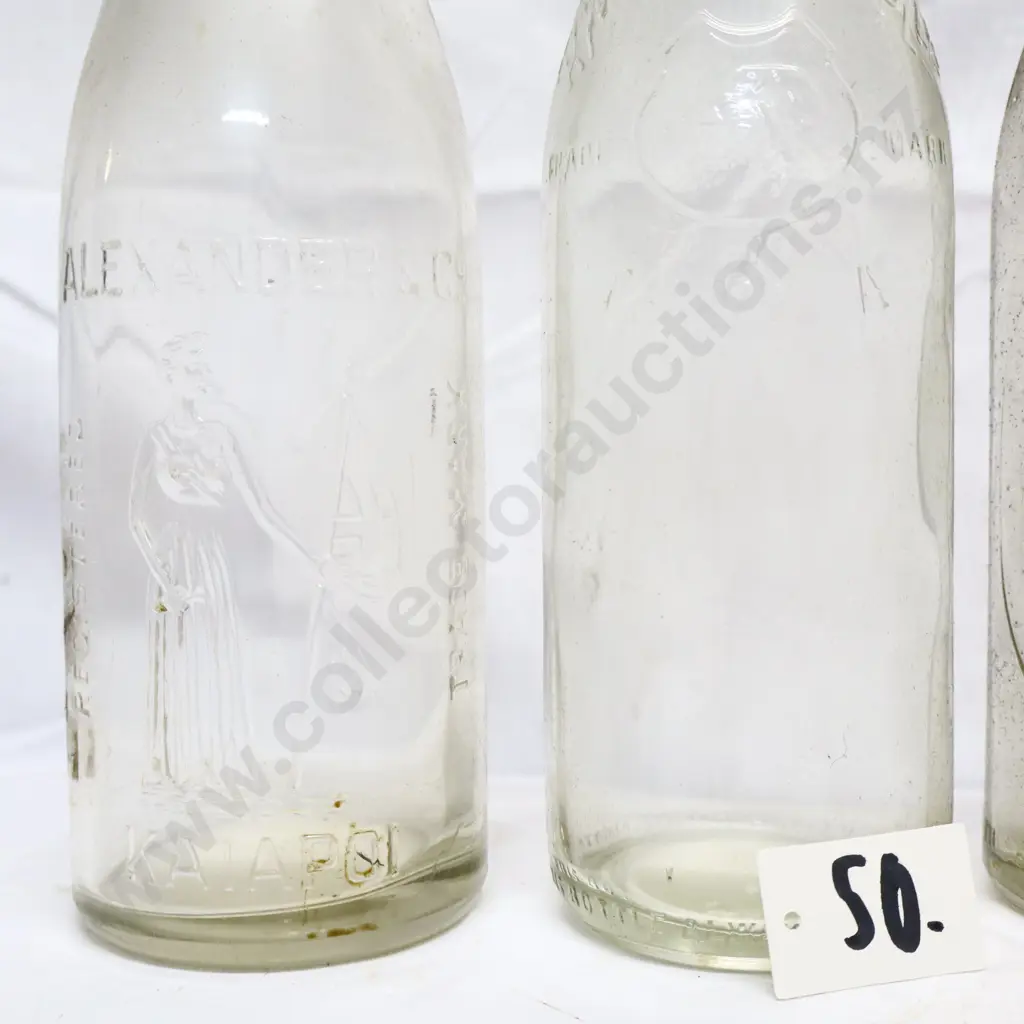 Collection of Vintage 26oz Embossed Crown Top Bottles #1 Image 1++