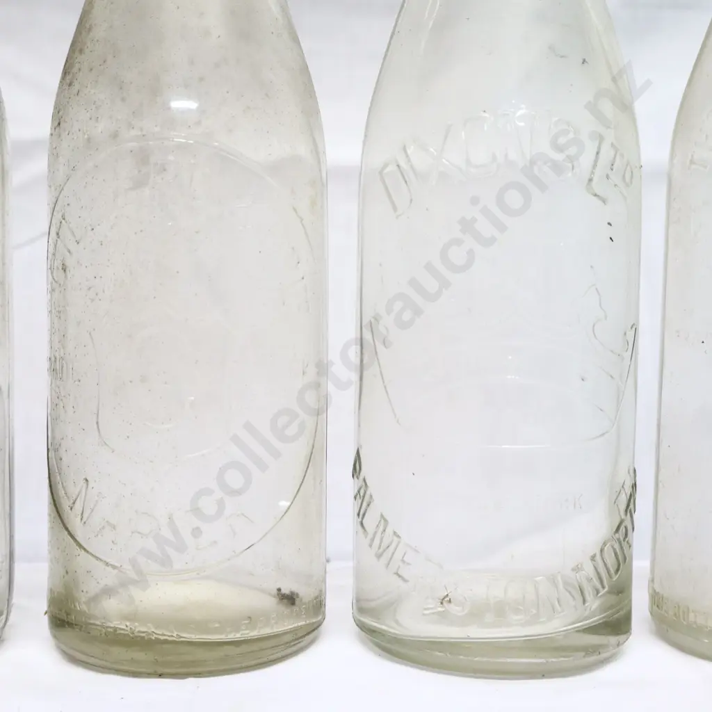 Collection of Vintage 26oz Embossed Crown Top Bottles #1 Image 1++