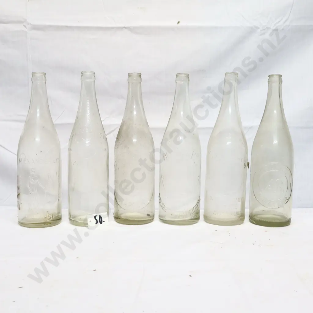 Collection of Vintage 26oz Embossed Crown Top Bottles #1 Image 1++