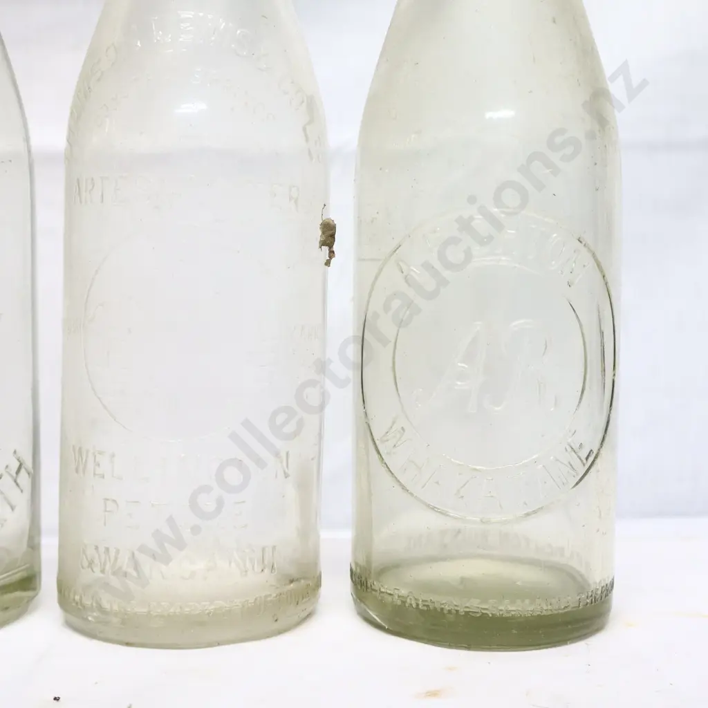 Collection of Vintage 26oz Embossed Crown Top Bottles #1 Image 1++