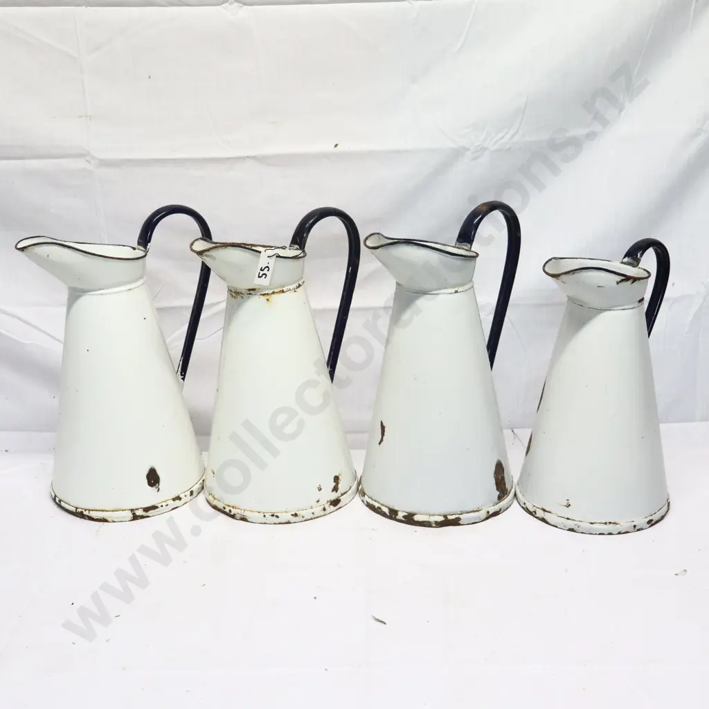 Collection of White Enamel Jugs Image 1++
