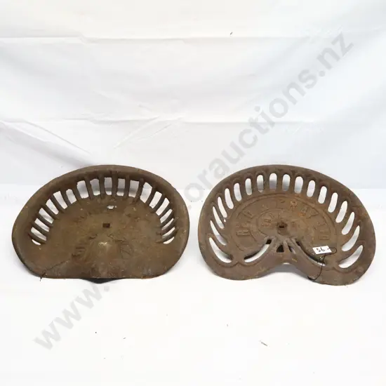 Pair of Cast Iron Tractor Seats
