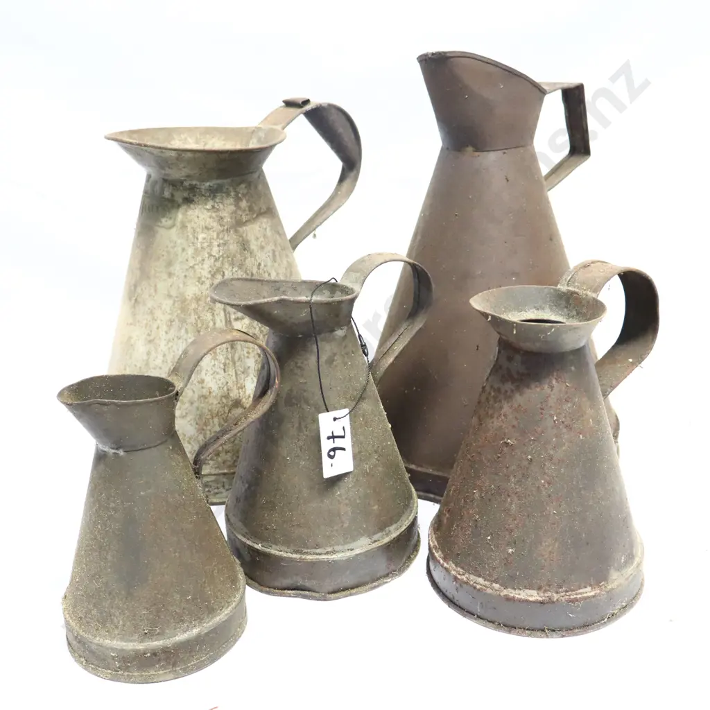 Collection of Antique Metal Oil Jugs Image 1++