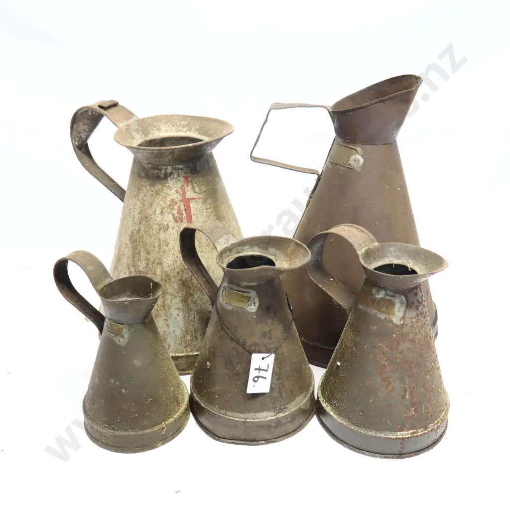 Collection of Antique Metal Oil Jugs Image 1++
