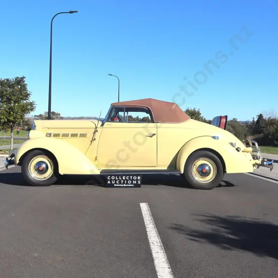 1937 Packard Model 115 Roadster.